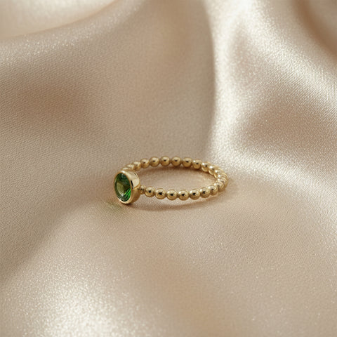 Goud vergulde ring met groene zirconia