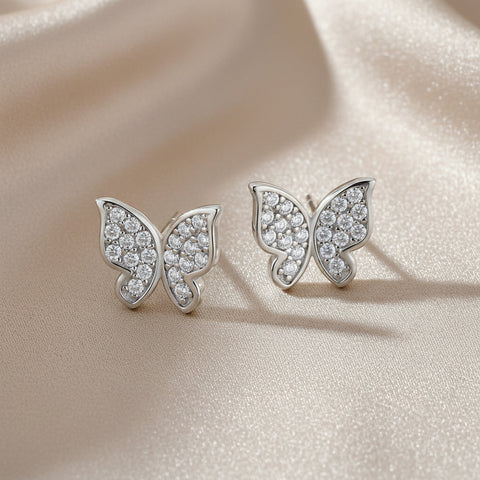 Zilveren vlinder kinderoorbellen met witte zirconia