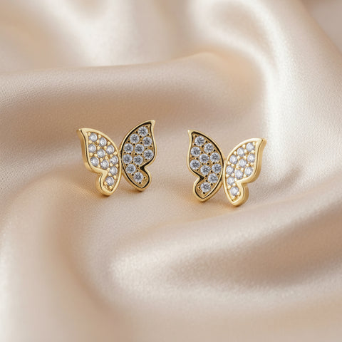 Goud vergulde vlinder kinderoorbellen met witte zirconia